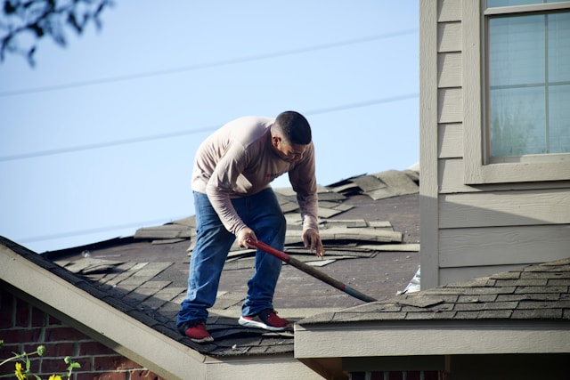 men working on a roof